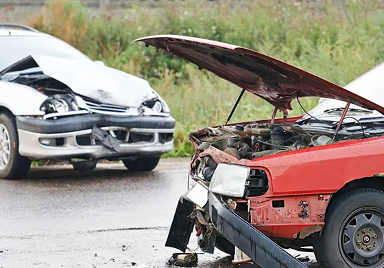 Two damaged cars after a collision emphasize the importance of choosing reliable services for accident recovery.